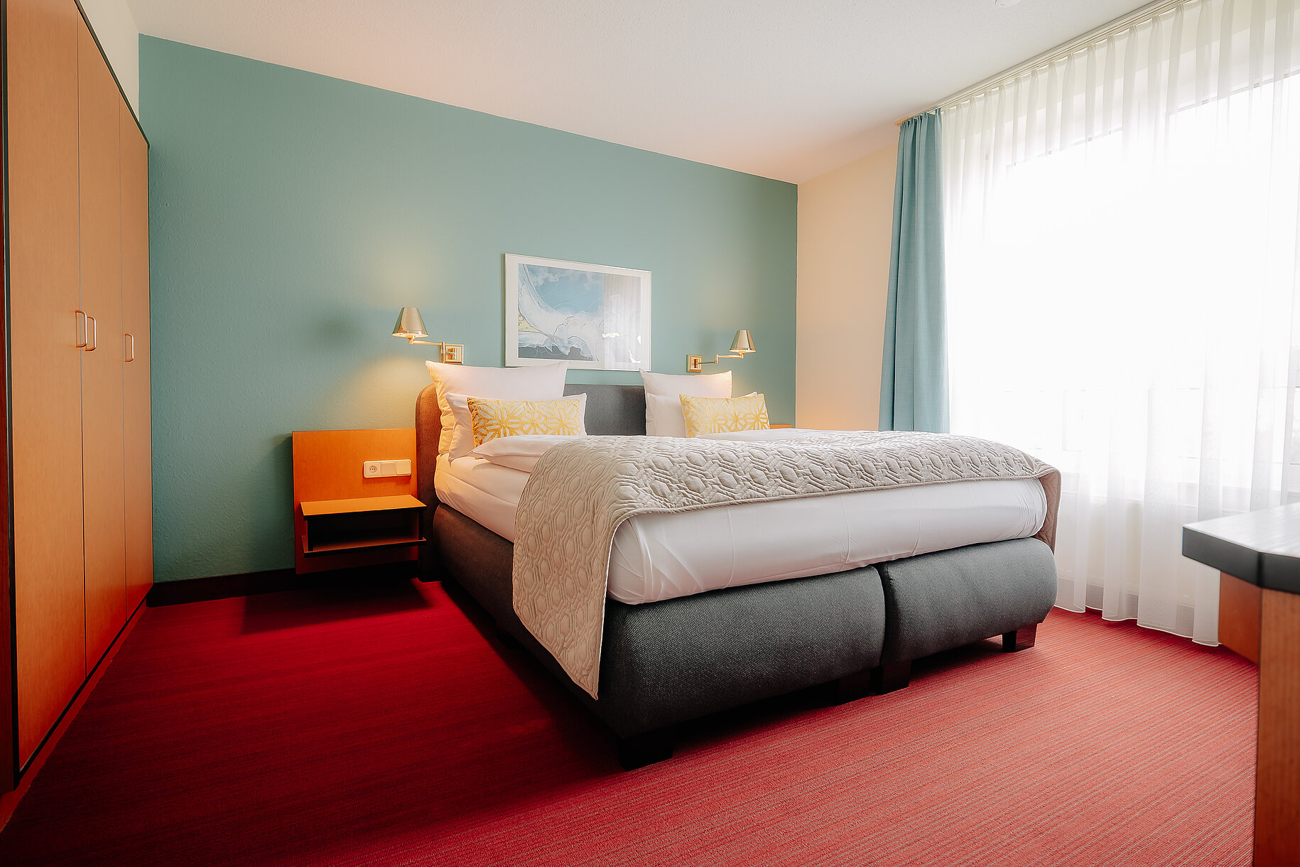 Panorama Suite im CASCADA Hotel Rheine – Modern & großzügig Weitläufige Panorama Suite mit modernem Interieur im CASCADA Hotel Rheine