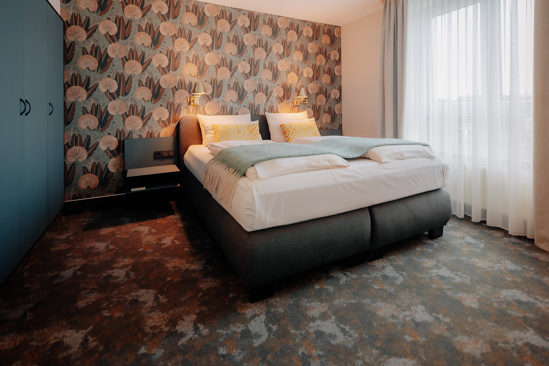 Panorama Suite im CASCADA Hotel Rheine – Modern & großzügig Weitläufige Panorama Suite mit modernem Interieur im CASCADA Hotel Rheine